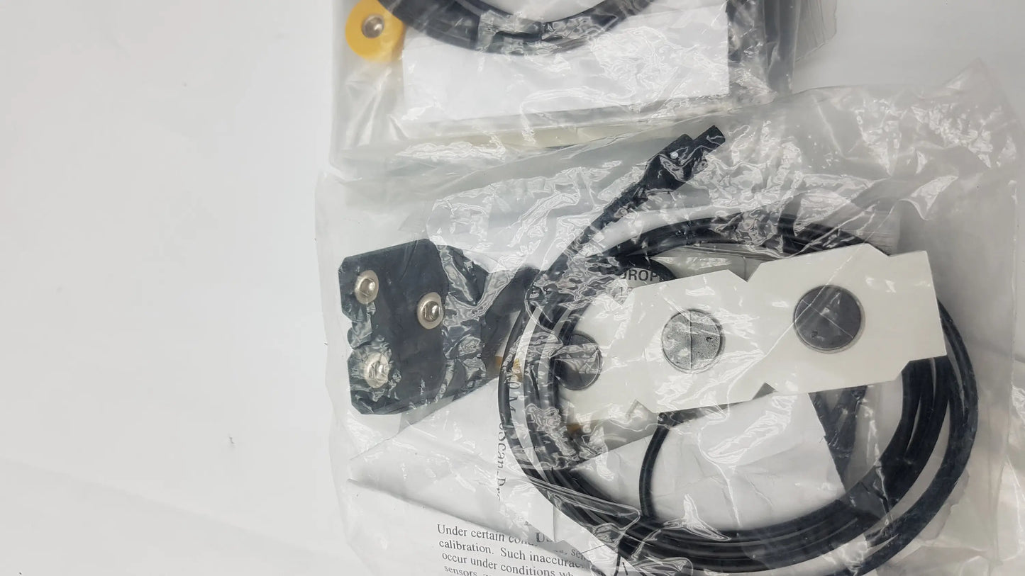 Black and white industrial sensor with coiled cable for physiological data acquisition by thought technology sa7500 procomp infininti