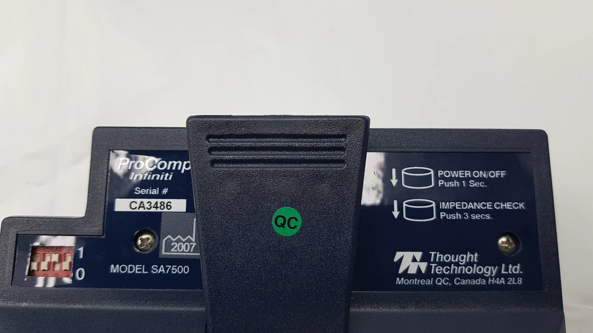 Black plastic Thought Technology SA7500 ProComp Infiniti biofeedback encoder with labeled buttons for physiological data acquisition