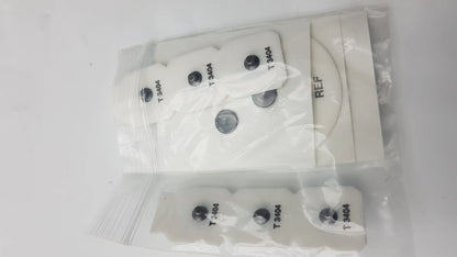 White plastic mounting plates with black circular fasteners labeled t 3404 on the back of thought technology sa7500 procomp infiniti for physiological data acquisition
