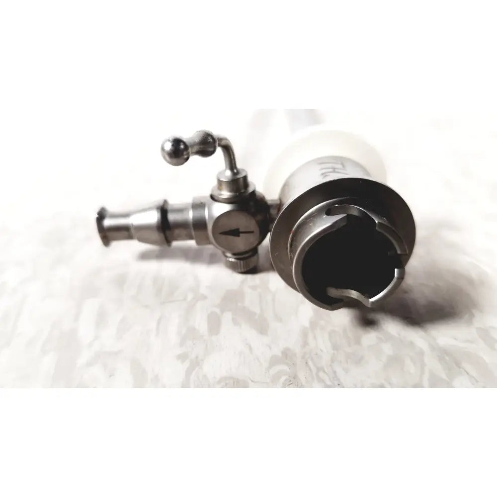 Silver metallic ths arthroscopy sheath with curved handle, circular opening, and engraved markings for 5mm use