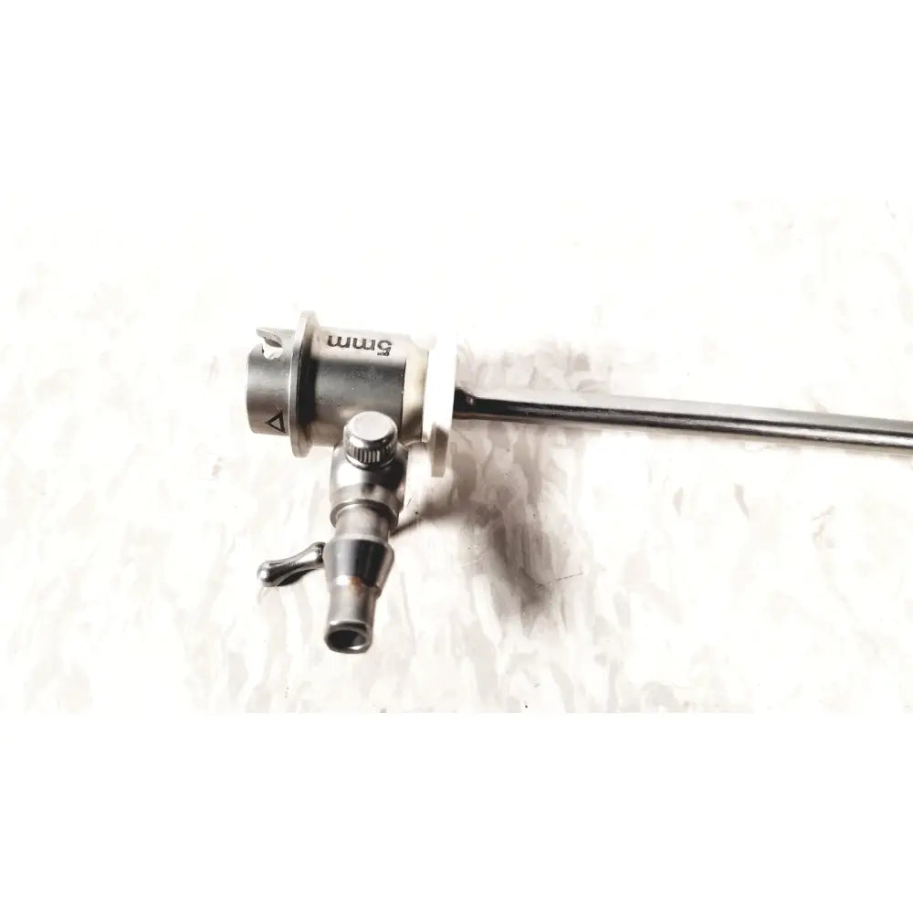 Silver-colored 5mm surgical endoscope with metallic body and articulated joints in ths arthroscopy sheath product
