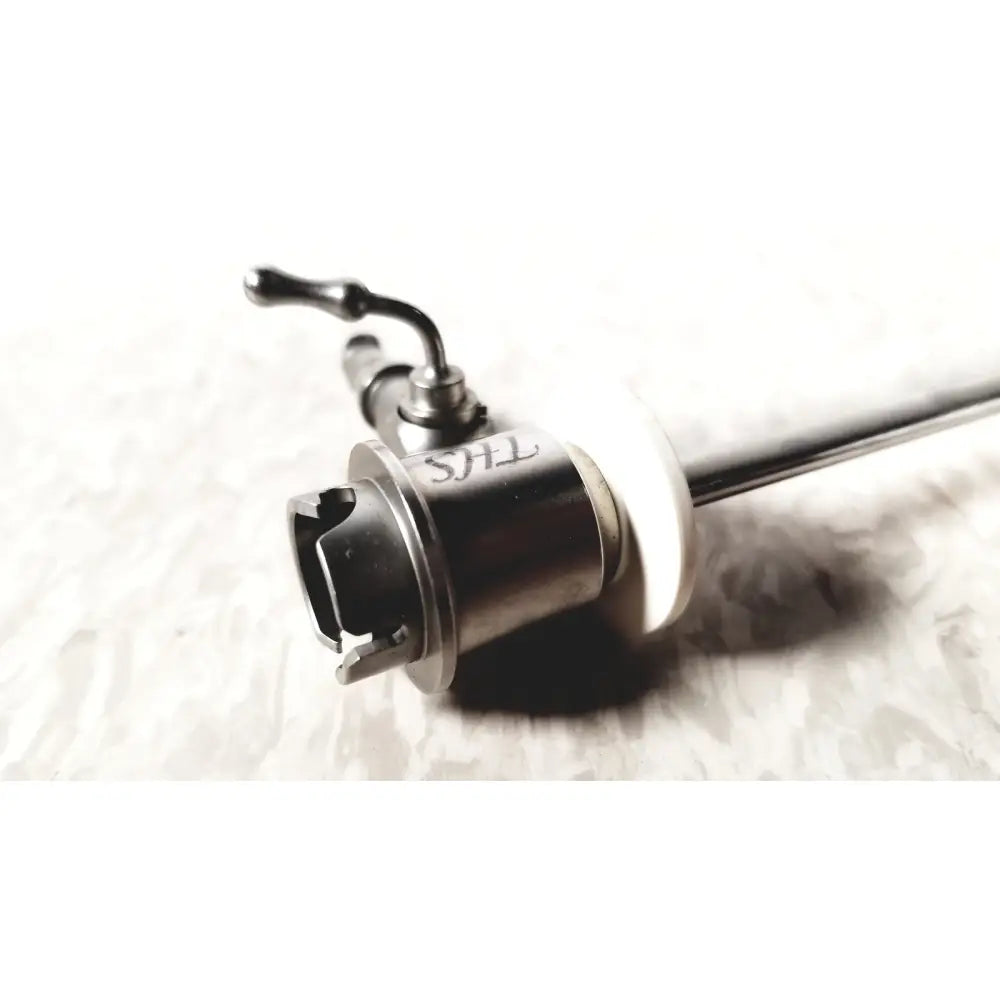 THS arthroscopy sheath for 5mm with metallic handle and white plastic component featuring engraved reuse medical markings