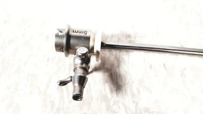 Silver-colored 5mm surgical endoscope with metallic body and articulated joints in ths arthroscopy sheath product