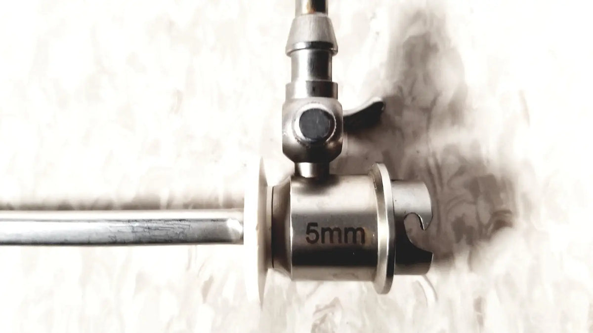 Ths arthroscopy sheath for 5mm is a sleek metallic reuse medical endoscope with a polished silver finish and precise engineering
