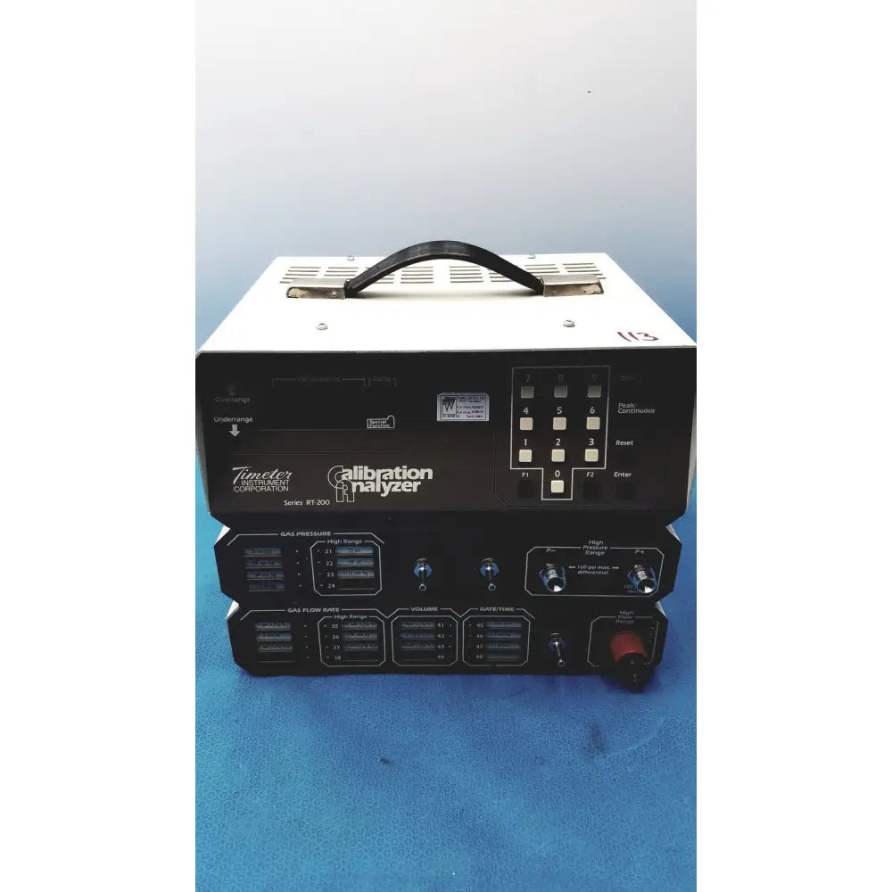 Black and white timeter instrument corporation rt-200 calibration analyzer with handle for precise measurement