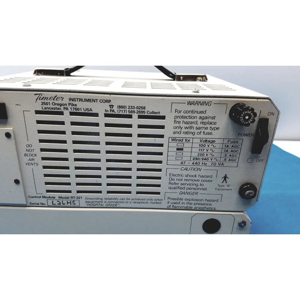 White metal power supply unit with ventilation slots and control knobs for timeter instrument corporation rt-200 analyzer