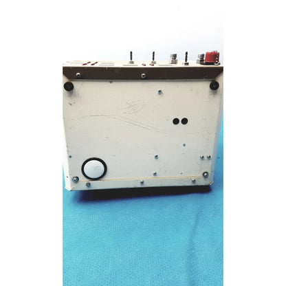 Vintage off-white metal calibration analyzer with red knob and silver connectors by Timeter Instrument Corporation