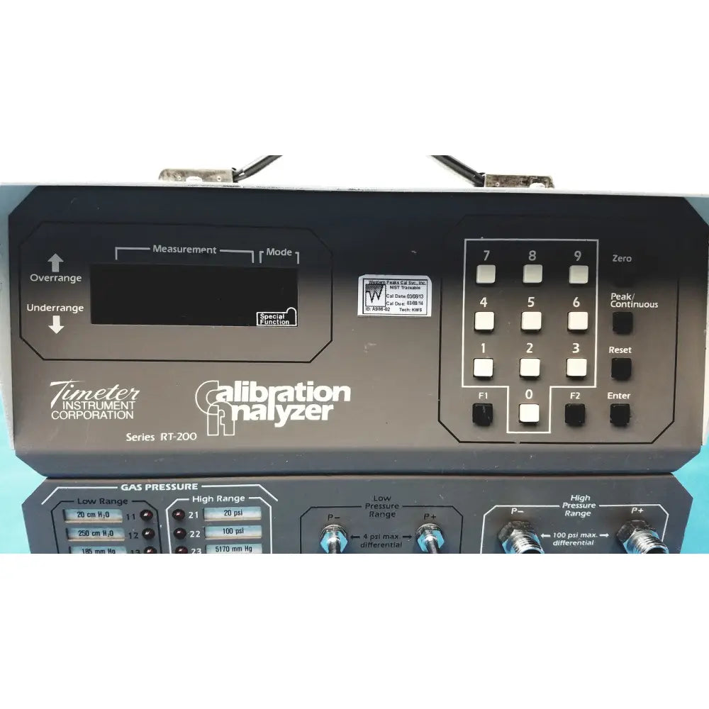 Black Timeter Instrument Corporation RT-200 calibration analyzer with digital display and keypad for precise measurements