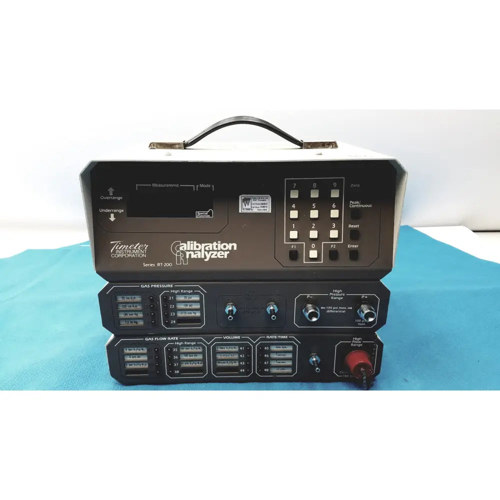 Black timeter instrument corporation rt-200 calibration analyzer with handle keypad and multiple control panels
