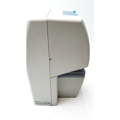 Gray zebra printer with sleek rectangular design and curved top panel in topcon medical advance automatic lensmeter