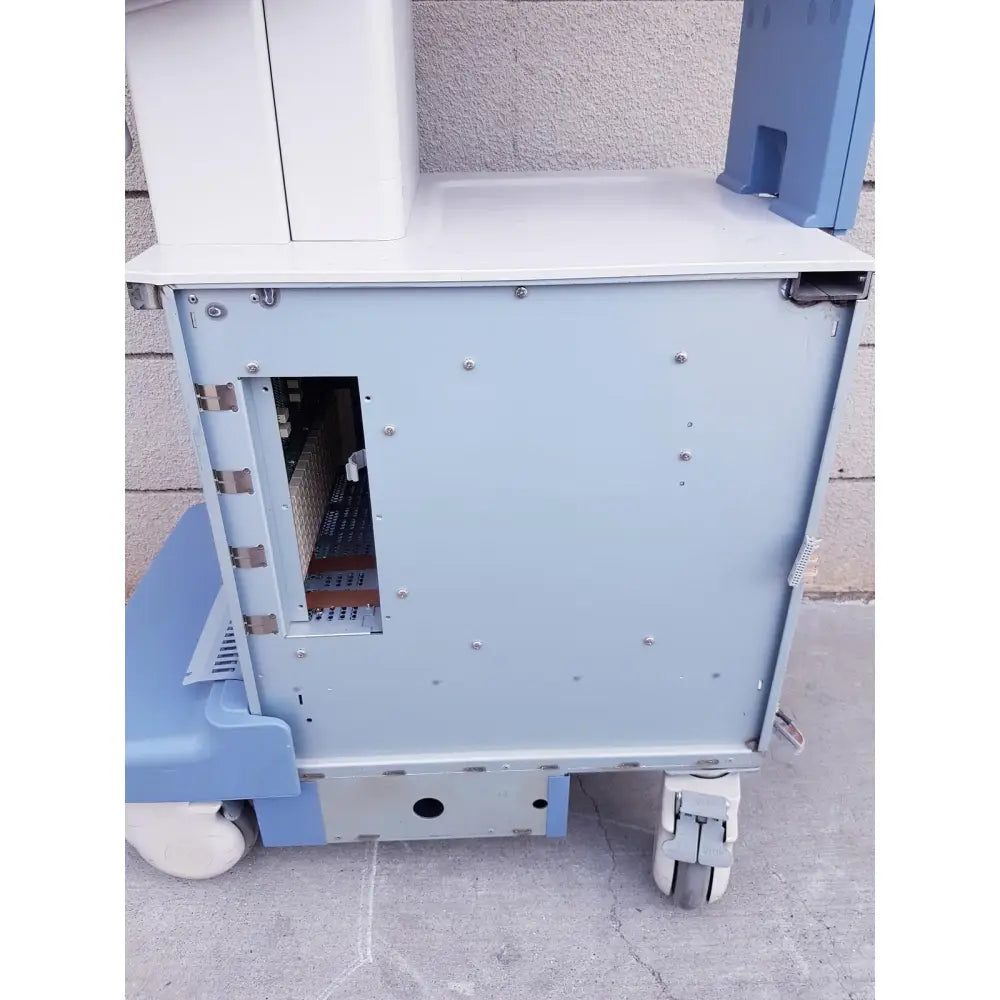 Light blue medical cart with white wheels and interior compartment for toshiba nemio ultrasound machine missing parts as-is