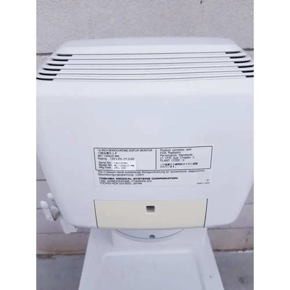 White plastic 12-inch monochrome display monitor with vented top and specification label for toshiba nemio ultrasound machine missing parts