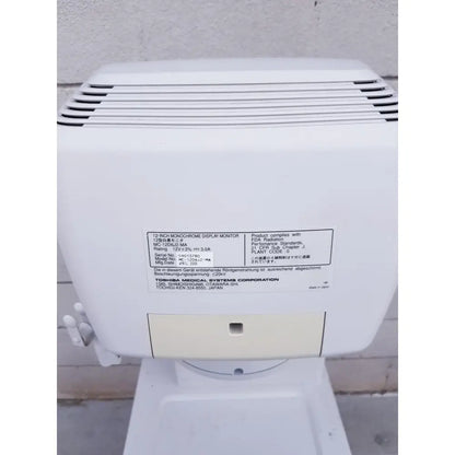 White plastic 12-inch monochrome display monitor with vented top and specification label for toshiba nemio ultrasound machine missing parts