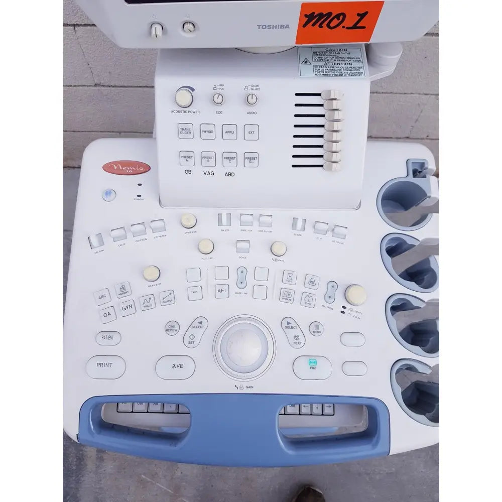 White and blue toshiba nemio ultrasound machine with control panel featuring buttons and knobs for reuse medical use as-is