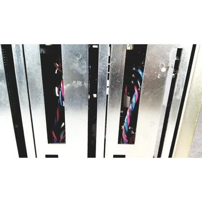 Silver metallic server rack with vertical slots and colorful twisted cables showing the back side of toshiba ra power rad92-1008 power supply