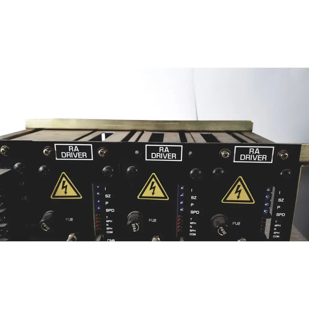 Black aviation ra driver modules with yellow lightning hazard symbols on labeled control panels of toshiba ra power rad92-1008 power supply back side