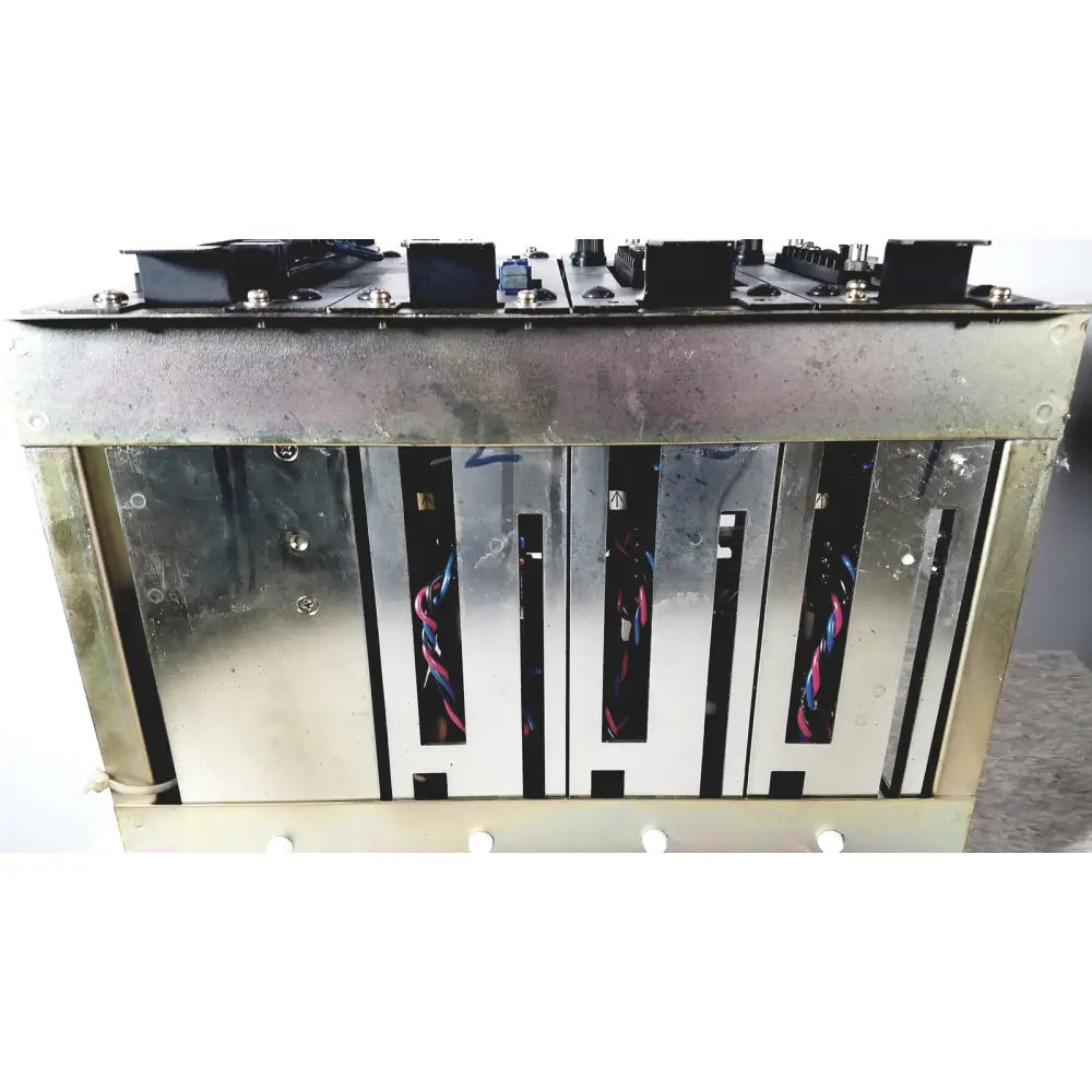 Industrial-grade metal server rack with visible internal wiring and mounting hardware of Toshiba RA Power RAD92-1008 power supply