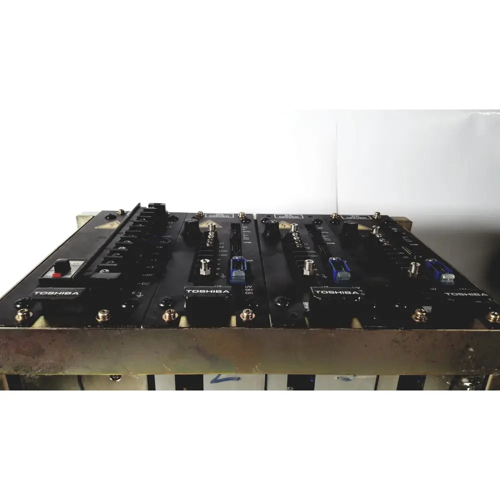 Black toshiba ra power rad92-1008 industrial control panel with knobs switches and blue-lit indicators for power supply