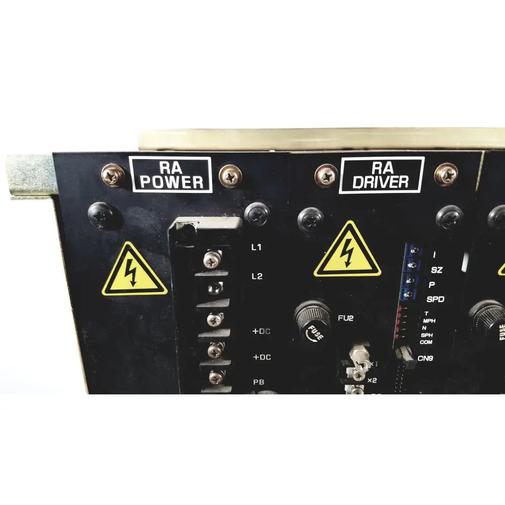 Backside of black toshiba ra power rad92-1008 power supply with labeled sections fuse holder and yellow lightning symbols