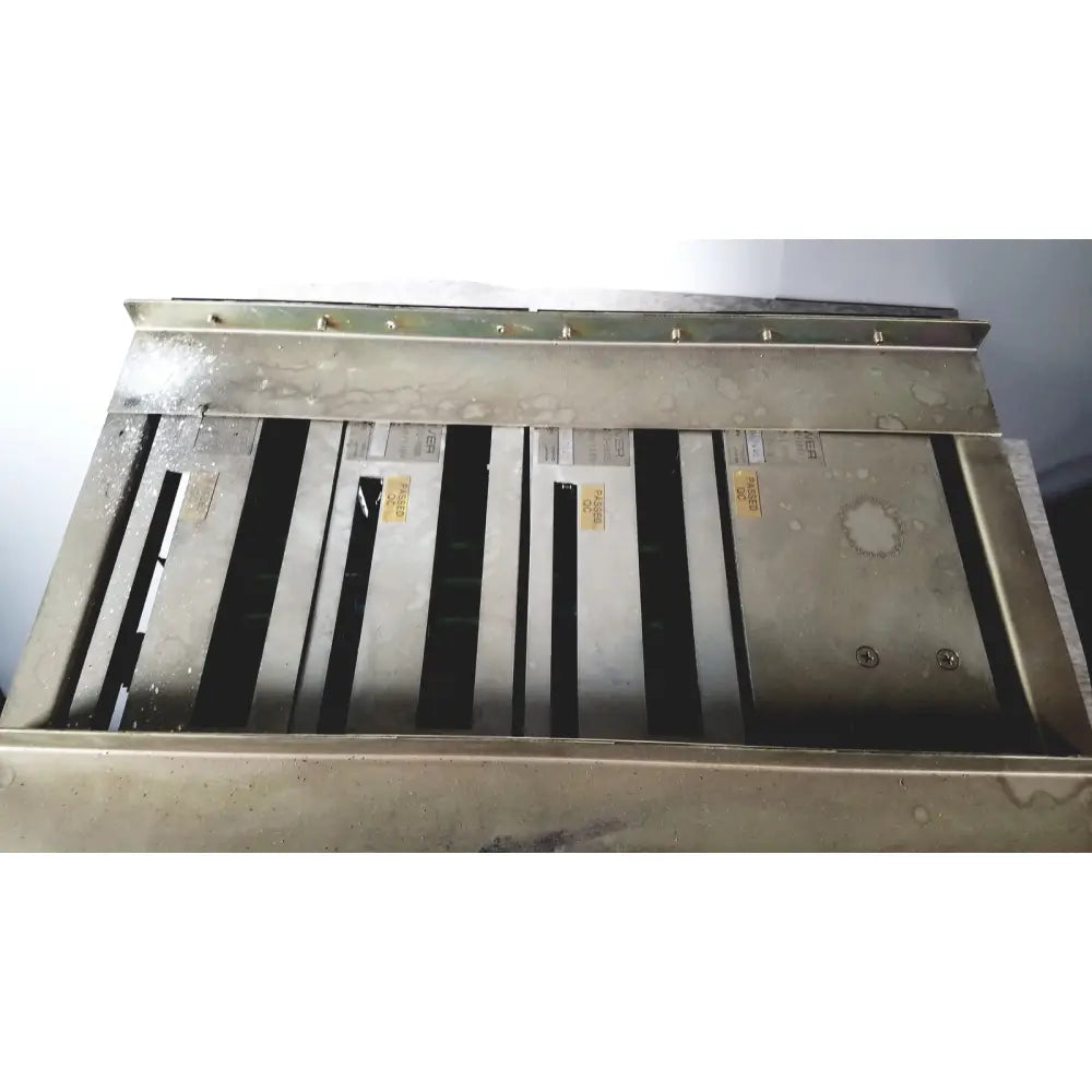 Industrial-grade metal ventilation grille with matte silver finish and vertical slats on toshiba ra power rad92-1008 power supply back side