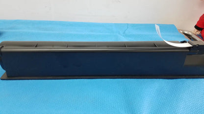 Black plastic genuine toshiba toner cartridge t-fc28-y with white label and metallic components on right side