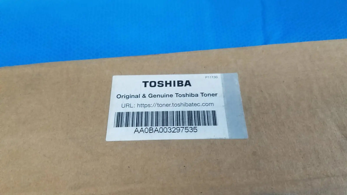 Original toshiba toner t-fc28-y yellow cartridge in cardboard box with white label showing genuine toshiba toner details