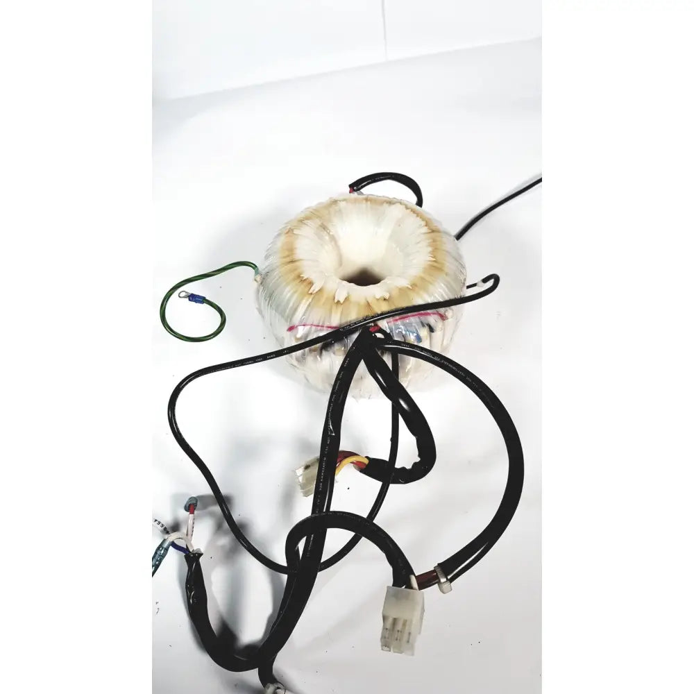 Beige cylindrical toshiba transformer bsm31-4471e with central hole and black wiring for xario ultrasound use