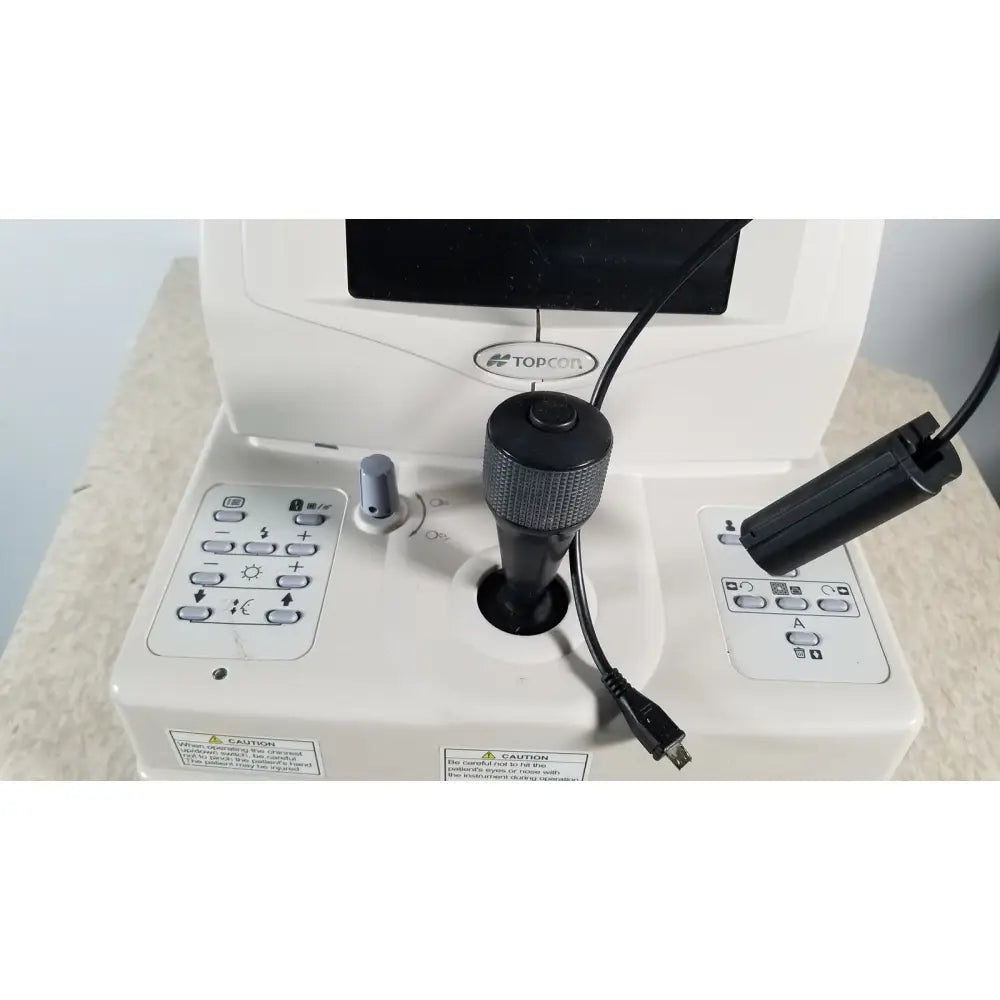 White and black industrial microscope with exposed wiring from the tracey itrace visual function analyzer wsl524m model