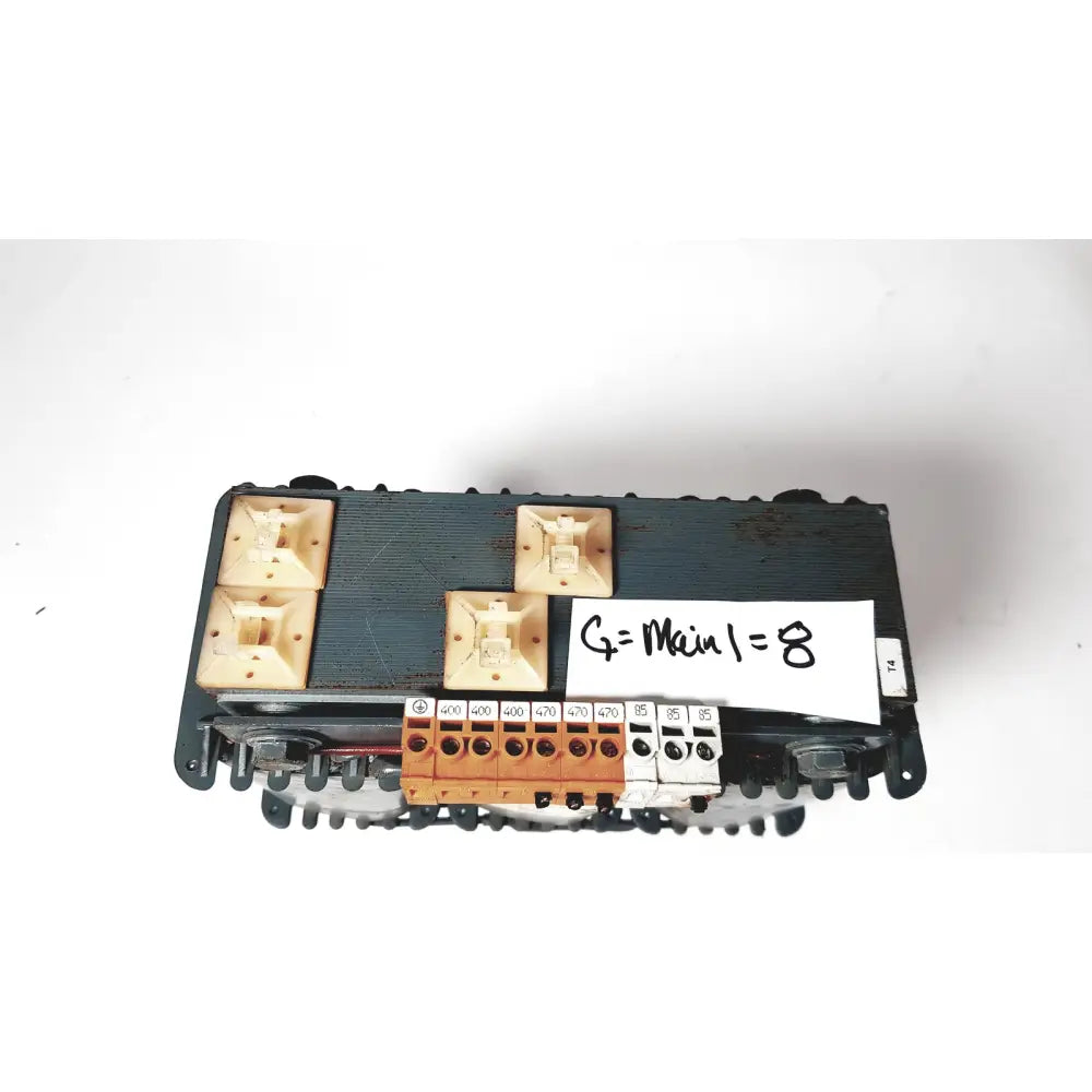 Black plastic electrical terminal block with beige and orange connectors on trafo jordi ch-4950 huttwil transformer