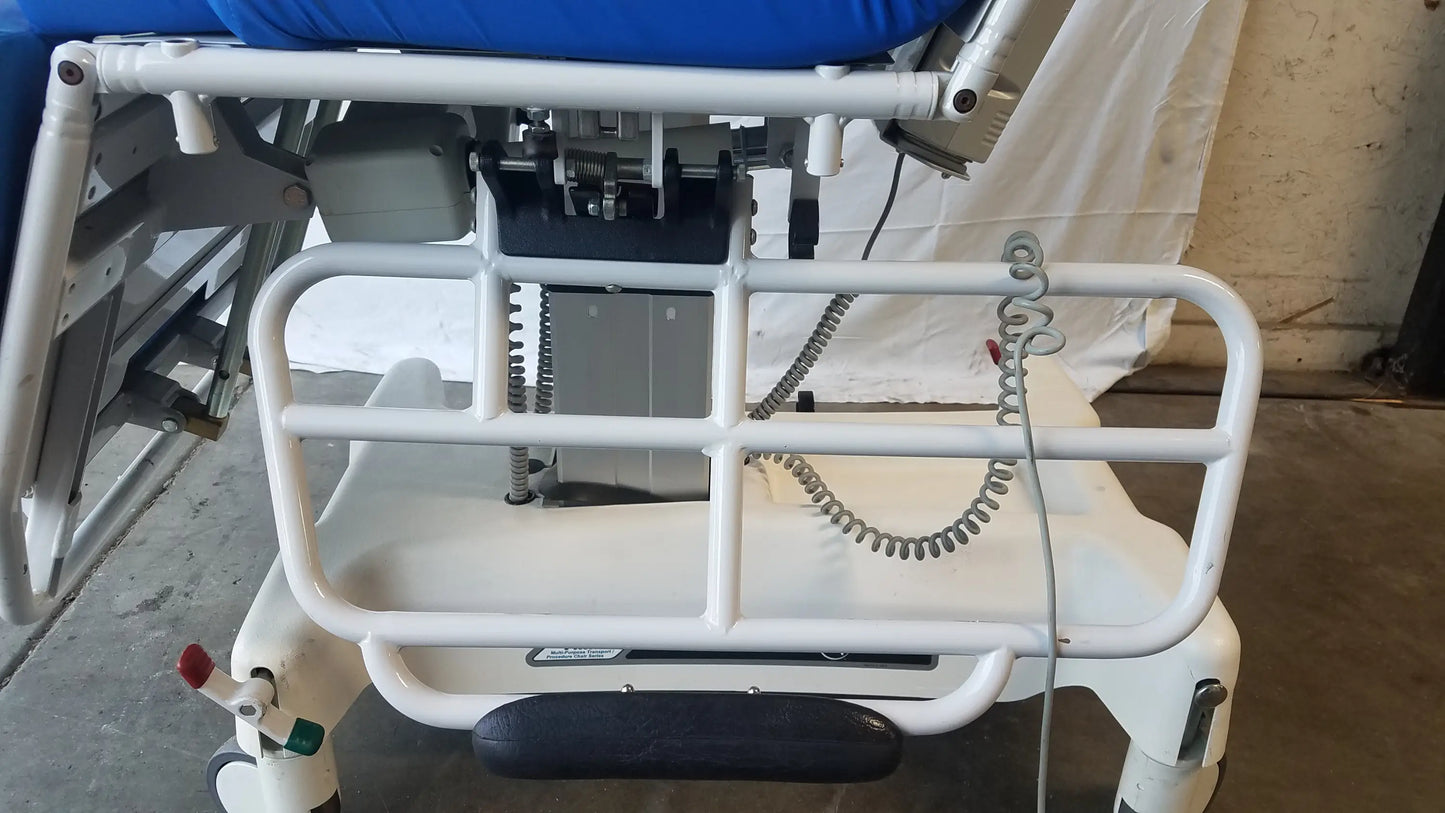 White metal multi purpose stretcher chair with blue padded headboard and black footrest by TransMotion Medical