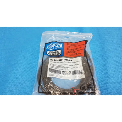 Black tripp lite 15ft cat6 gigabit patch cable coiled in clear plastic packaging with brand labeling