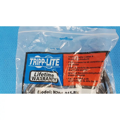 Tripp Lite 15ft cat6 patch cable in clear plastic packaging with blue and red label for gigabit networking use