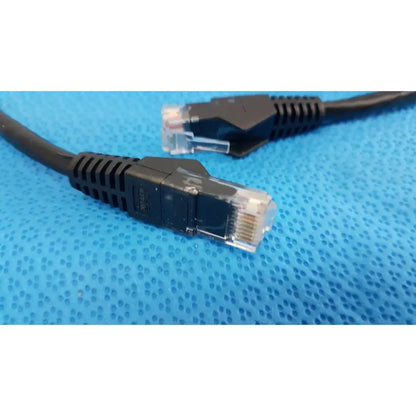 Black tripp lite 15ft cat6 patch cable with rj45 connectors and ribbed snagless molded plastic housing