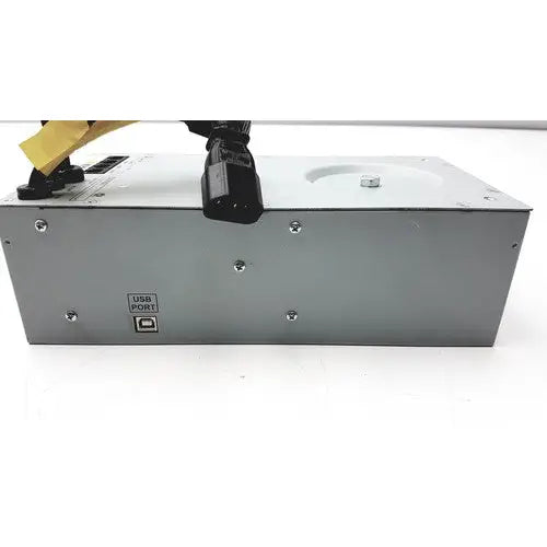 Silver metallic tripp lite hc150sl medical cart power supply unit with black ac input plug and labeled usb port backside