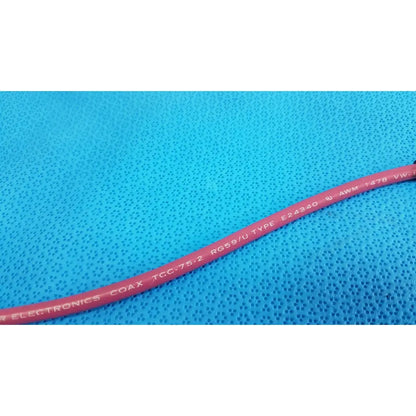 Red trompefter 14949-upcwx-24-75 coaxial cable with white printed specifications for pink video patch cord use