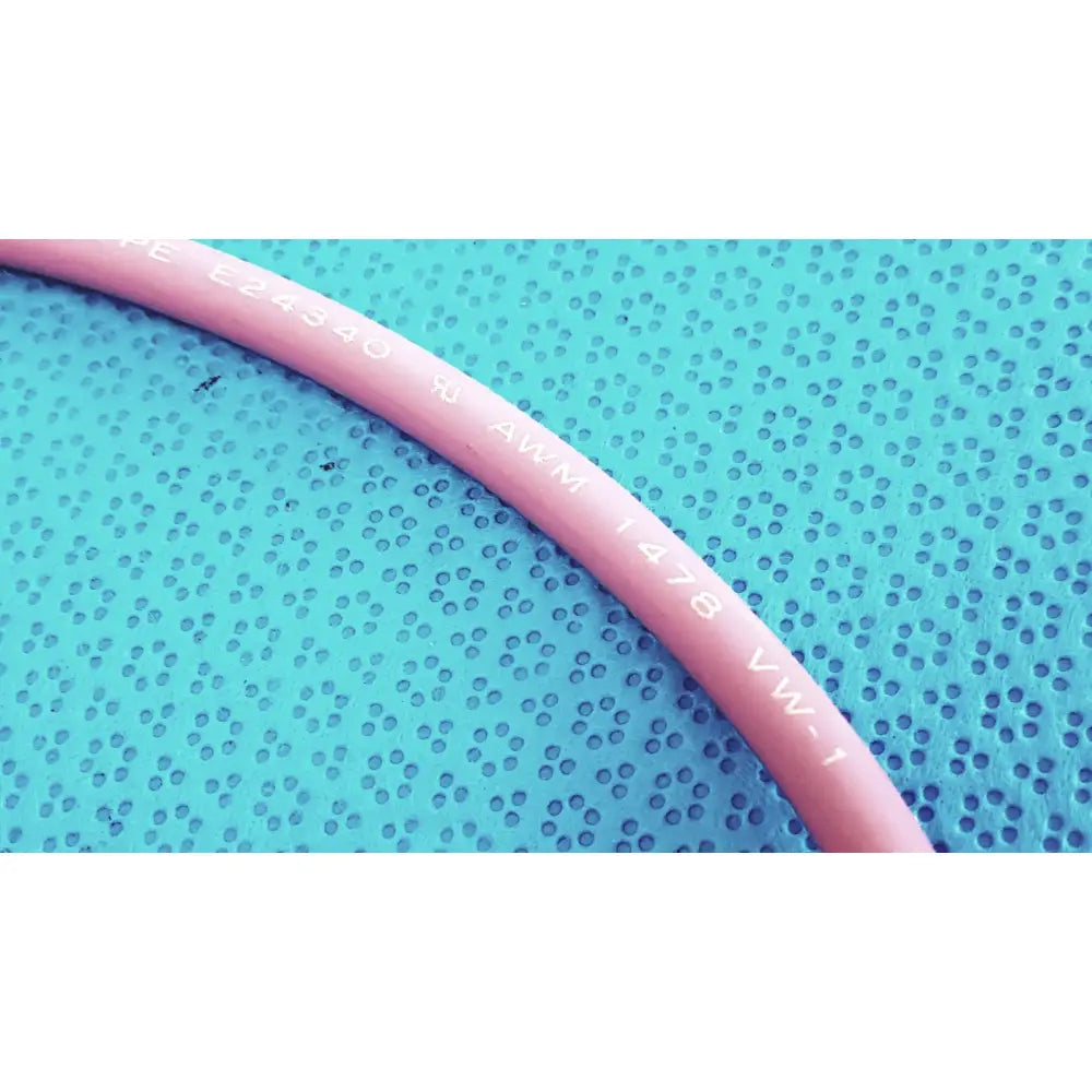 Pink insulated trompeter pink video patch cord with white printed specifications for broadcast use