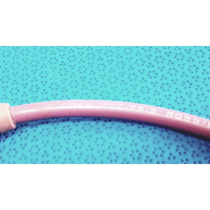 Pink insulated trompeter pink video patch cord with printed specifications 75 ohm coax cable for broadcast use