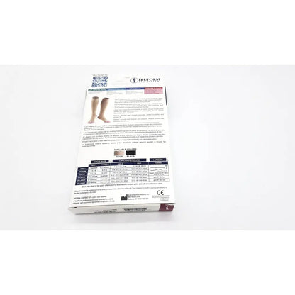 White cardboard shoe box with black and gray text showing truform leg health medical compression thigh high stockings black unisex