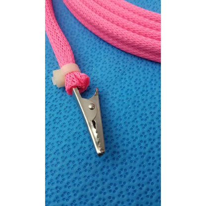 Pink braided cable with metal alligator clip and male plug designed for reuse medical applications