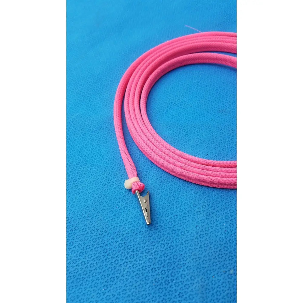 Pink braided cable with silver metal clip on one end and male plug on the other for reuse medical applications
