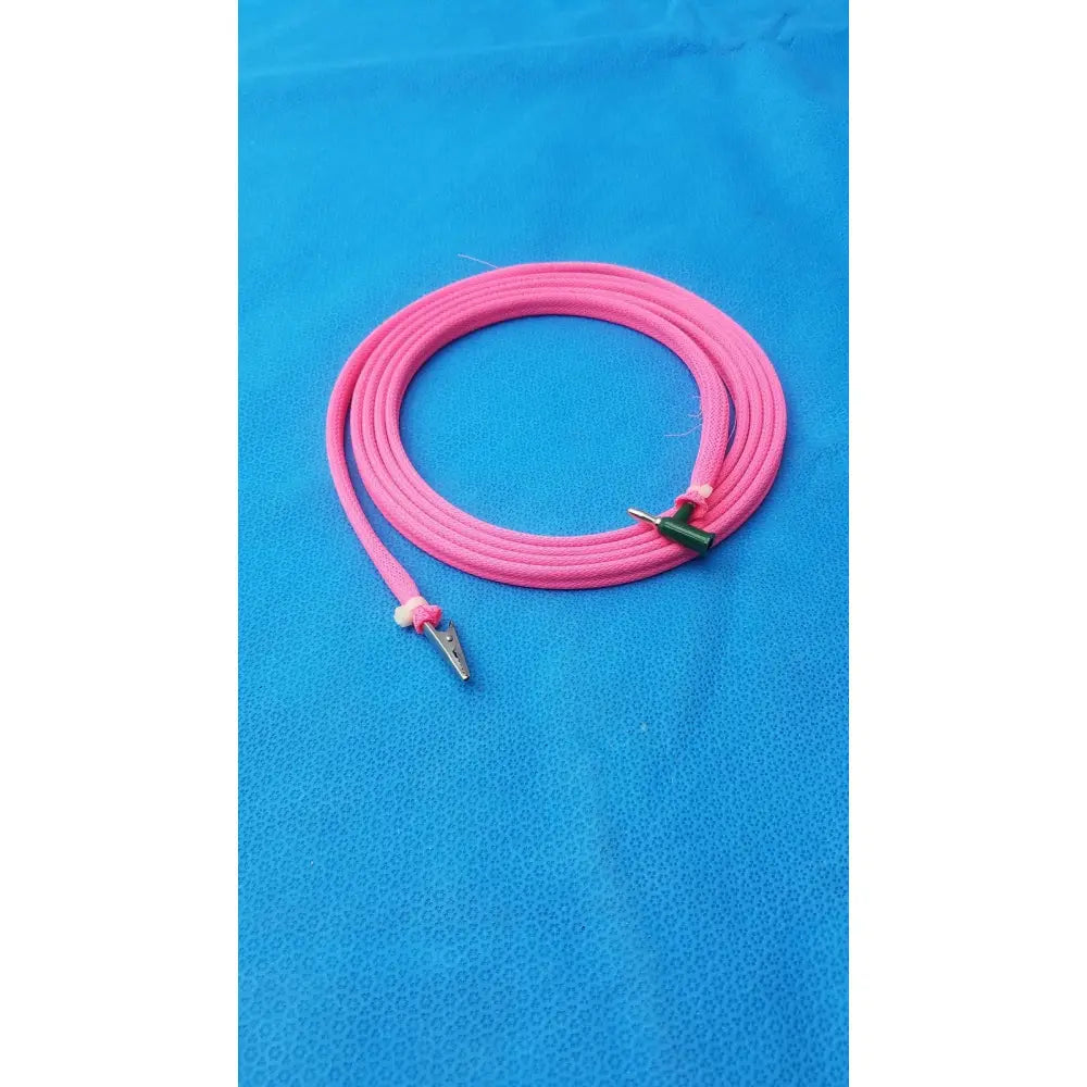 Pink braided cable with metal clips and a male plug designed for reuse medical applications