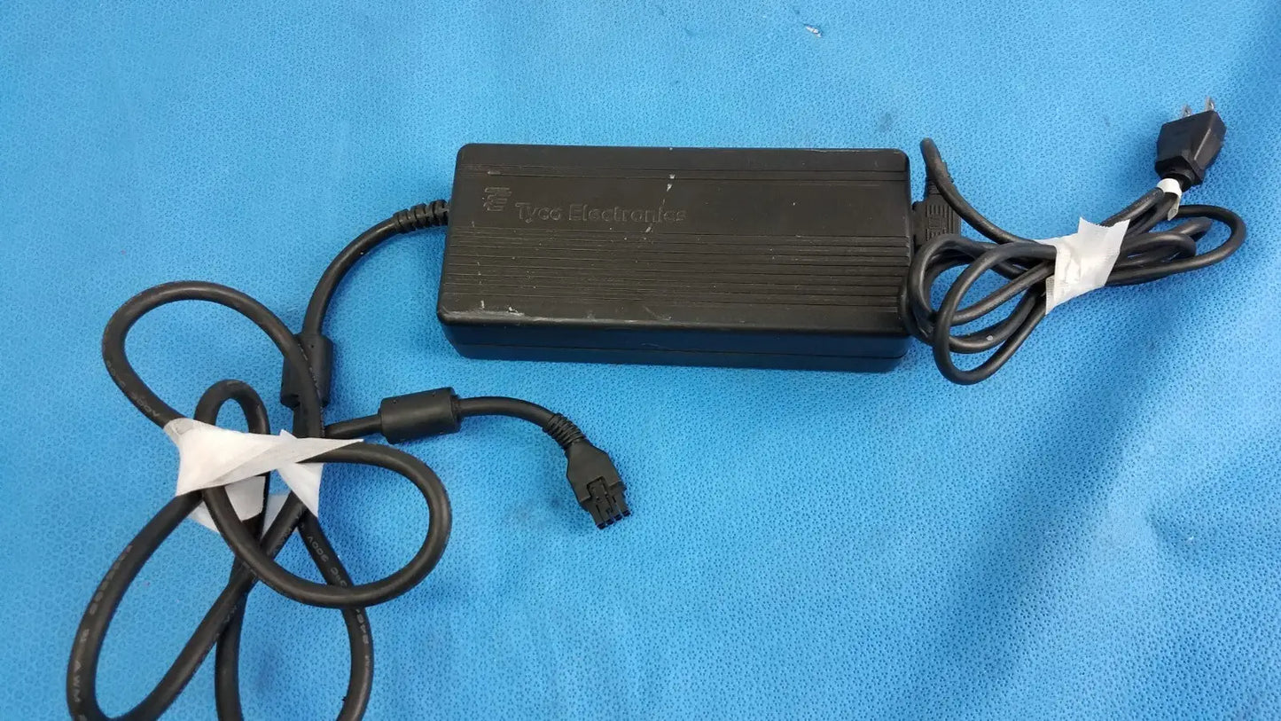 Reuse Medical Tyco Electronics AC Power Adapter – Power Supply – Electronic Equipment Test Equipment Manuals & Books, second-hand product photo 1
