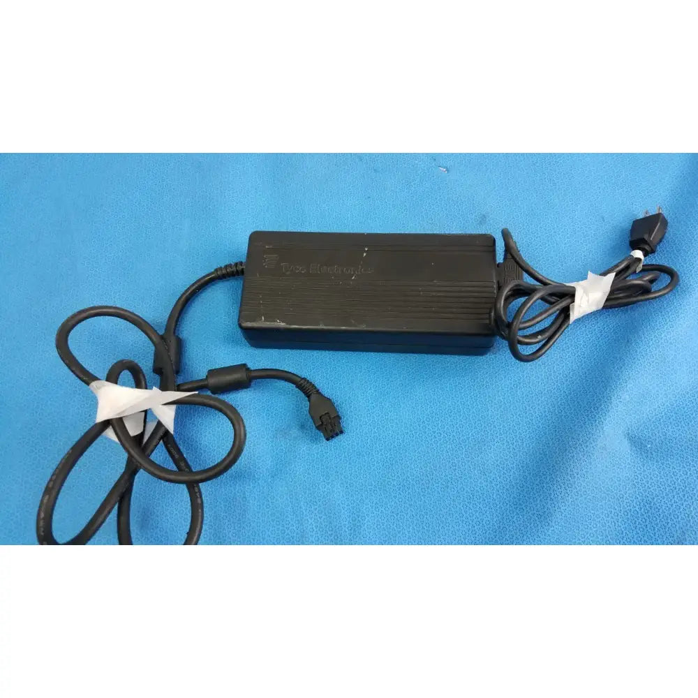 Reuse Medical Tyco Electronics AC Power Adapter – Power Supply – Electronic Equipment Test Equipment Manuals & Books, second-hand product photo 1
