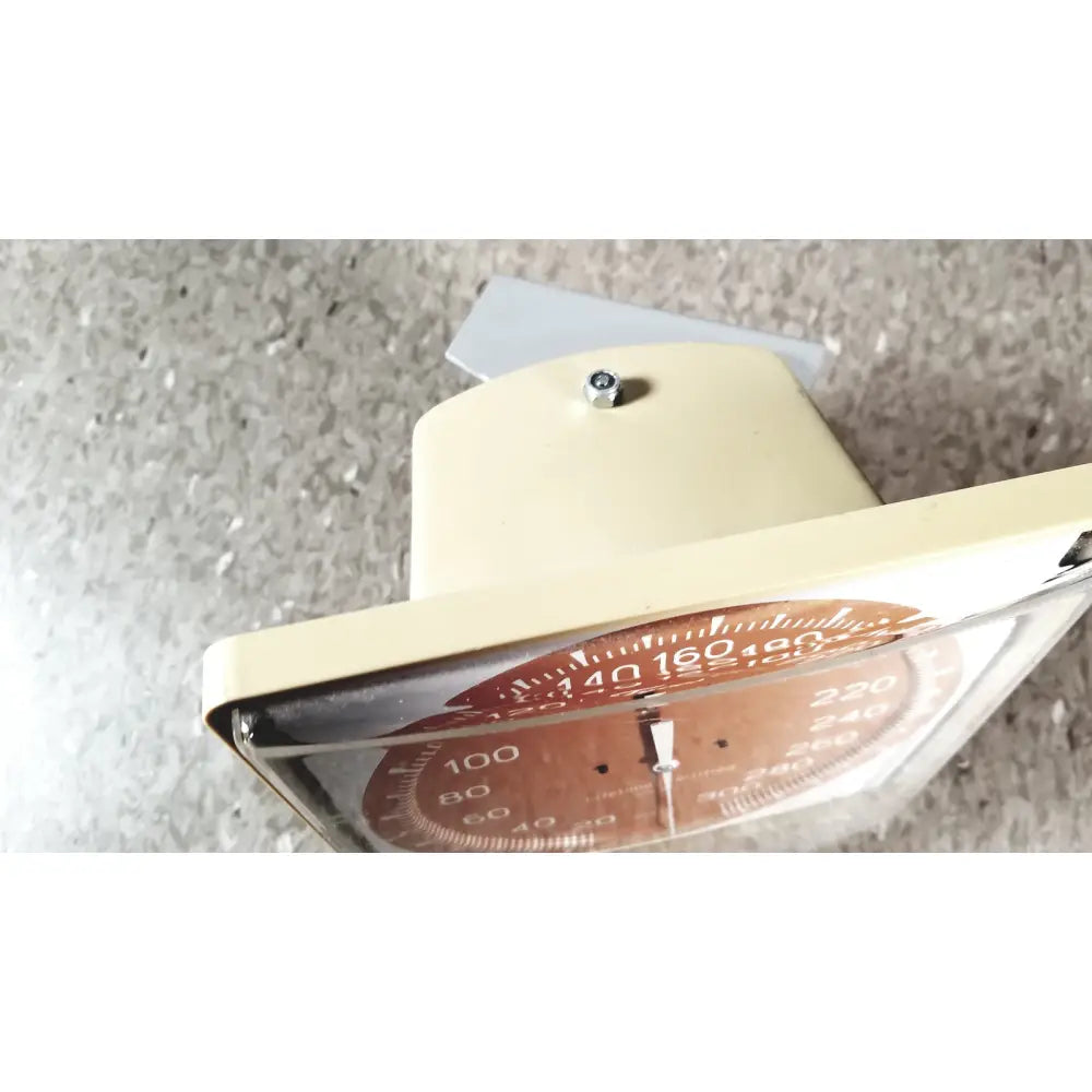Beige analog wall scale with circular dial marked in pounds and kilograms for tycos lifetime certified sphygmomanomet