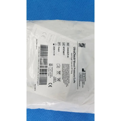 White plastic package containing ultracheck blood pressure cuff adult single tube with hp fitting for blood pressure measurement