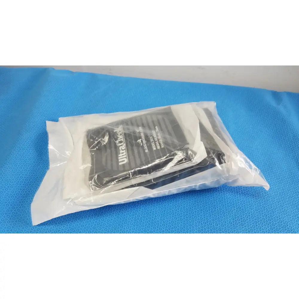 Black ultracheck blood pressure cuff adult single tube with hp fitting in clear plastic packaging for accurate monitoring