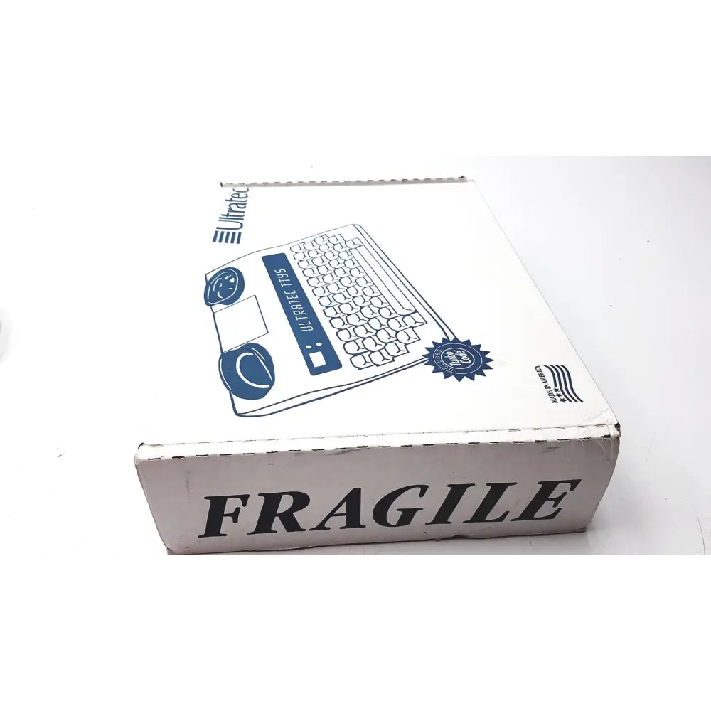 White cardboard box with blue ultratec superprint tts6 keyboard illustration and bold black fragile text for telephone printer tty
