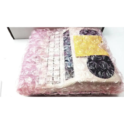 Beige ultratec superprint telephone printer tty with white keys and black accents wrapped in pink bubble wrap