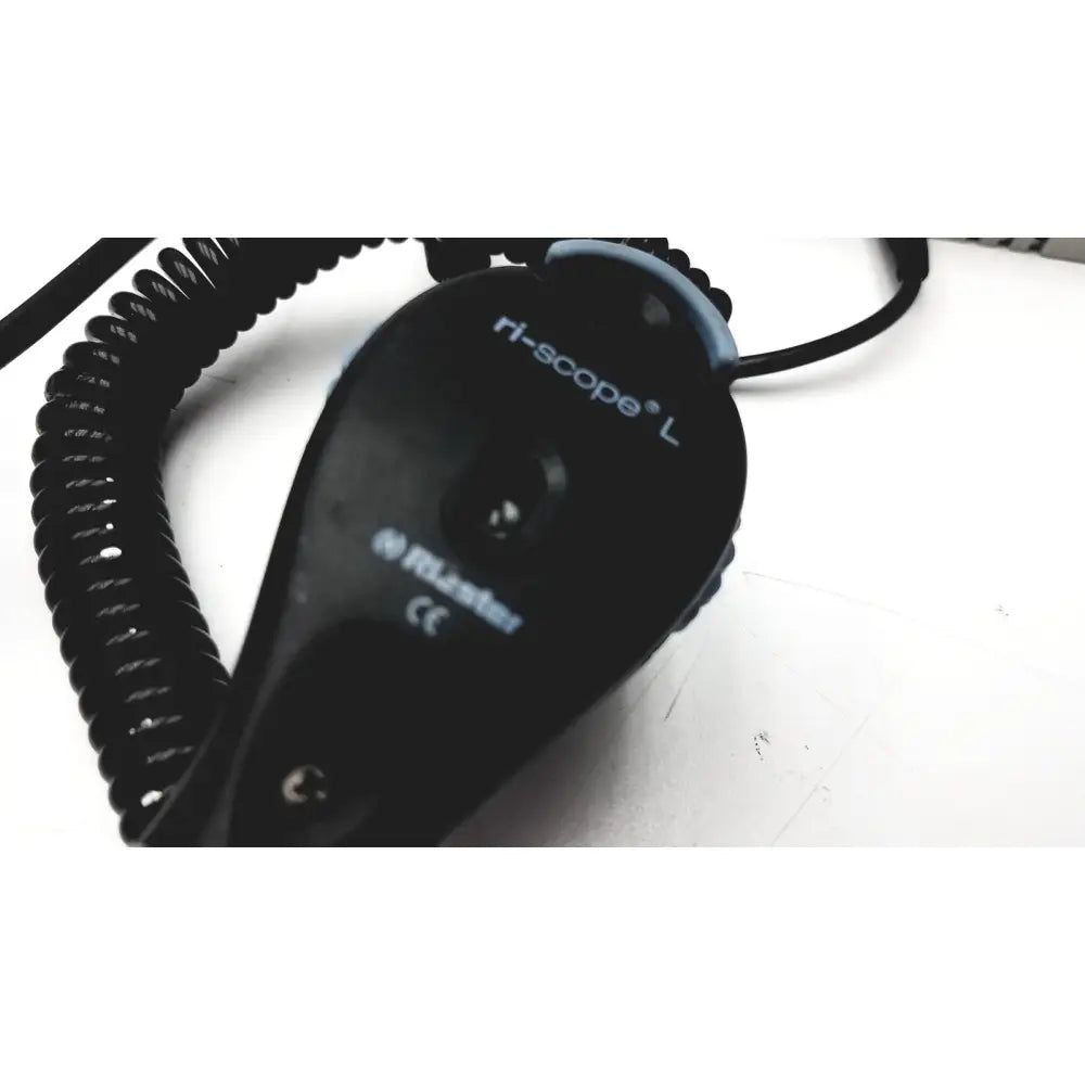 Black ri-scope l laser rangefinder with coiled cable and blue accent on top edge for ulvac air compressor unit model