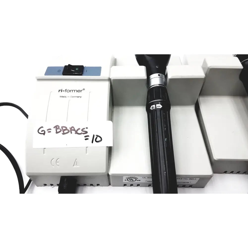 Black medical endoscope with silver metallic accents and ergonomic grip used in ulvac air compressor unit model for industrial application